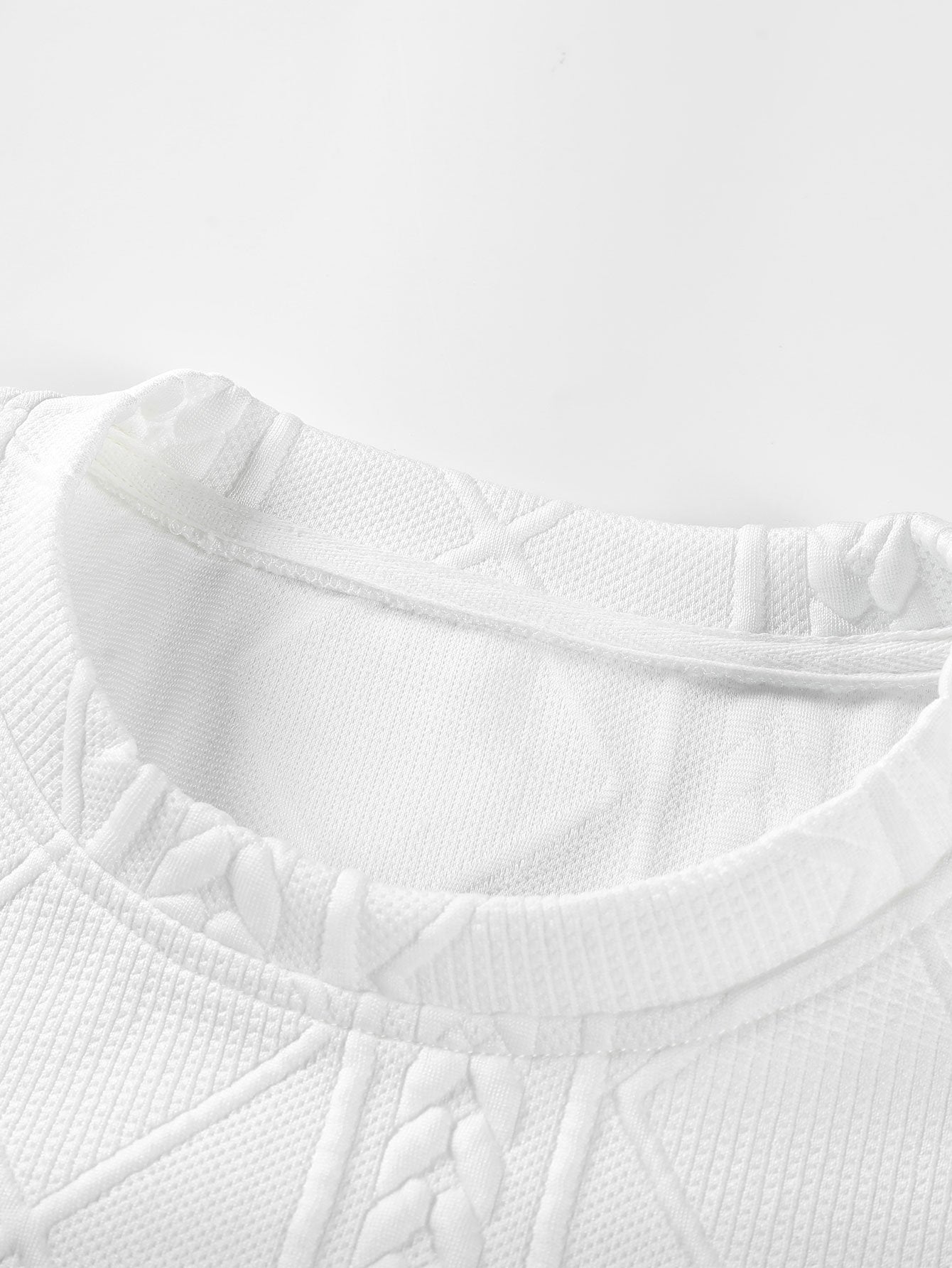 Geometric Jacquard Long Sleeve T-Shirt with Arc Hem